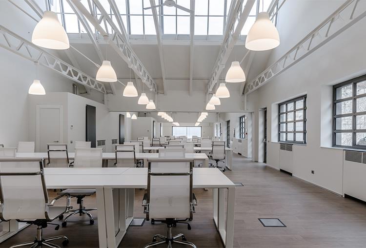 L'armonia di colori e superfici di Panaria Ceramica per l'hangar di "A&B"